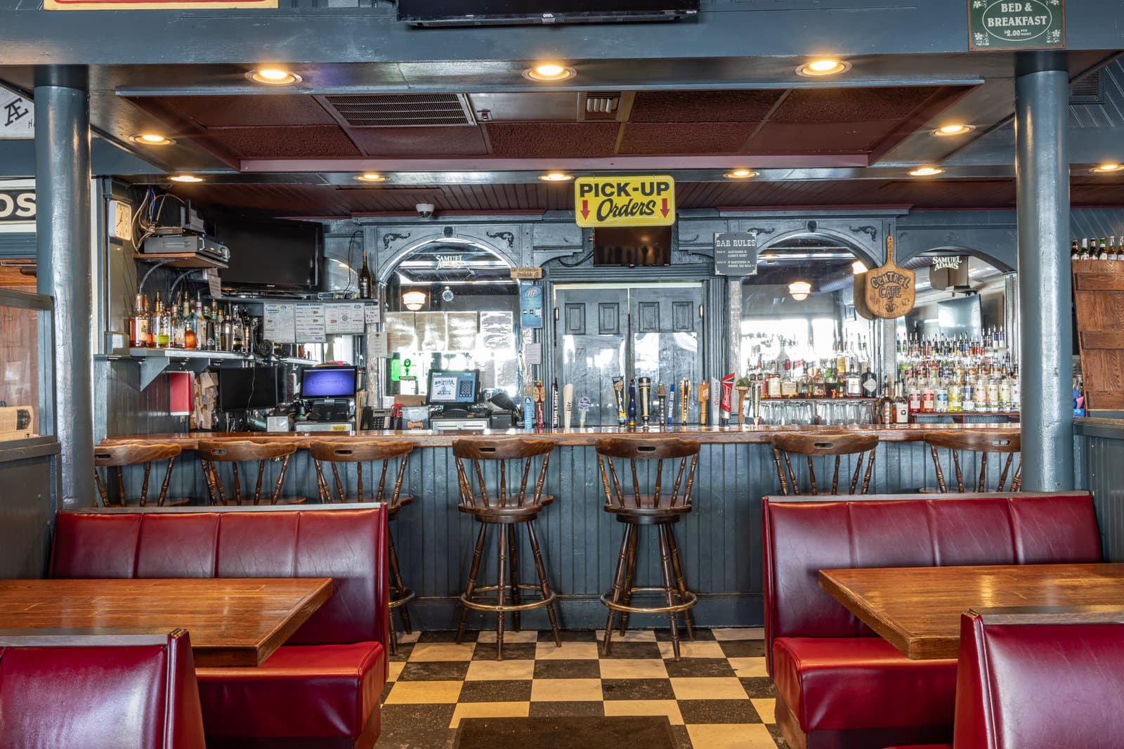 The bar room with its arched back bar and pick-up orders sign